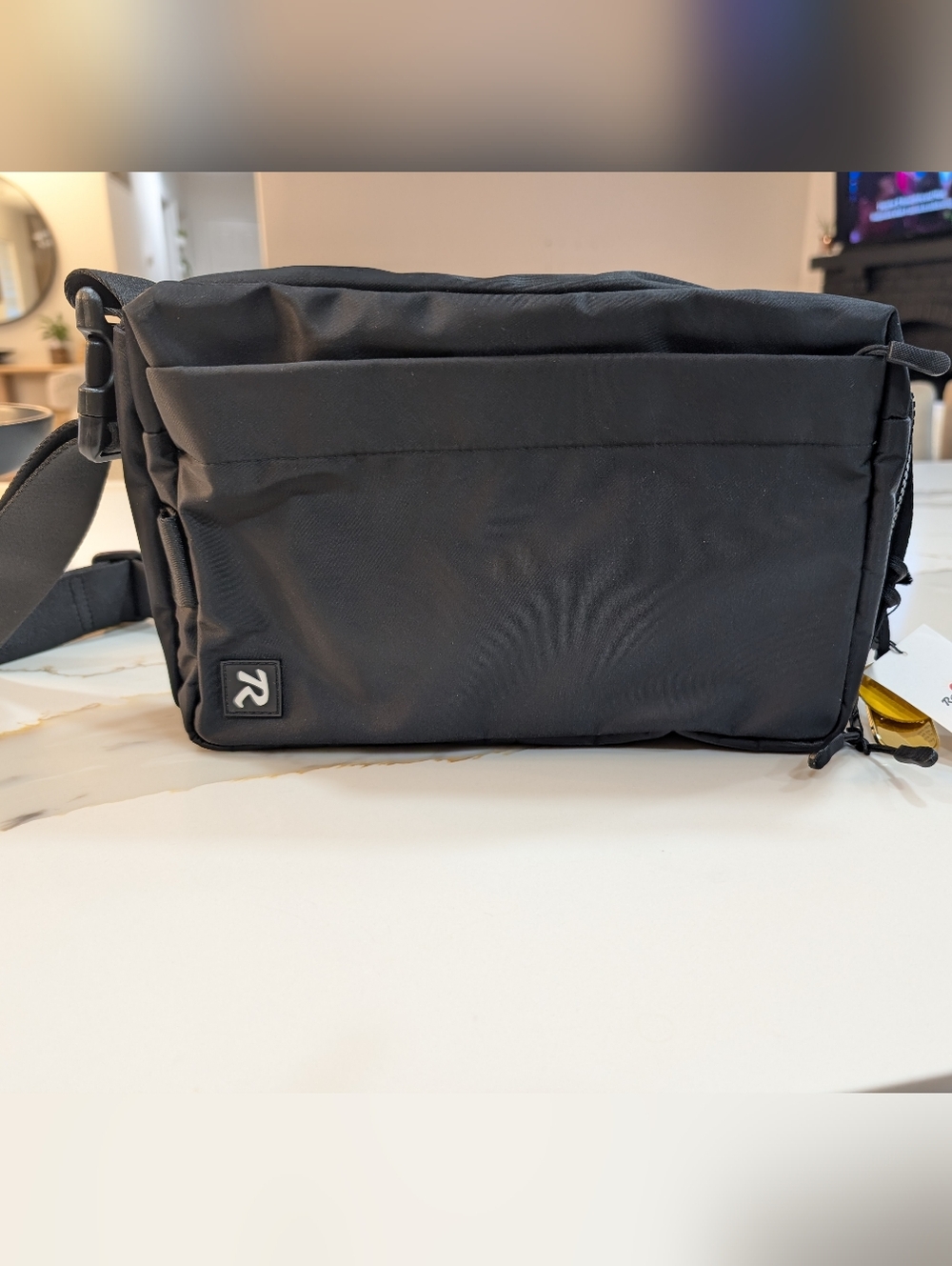 Reveille Black Backpack with Yellow Leather Charm